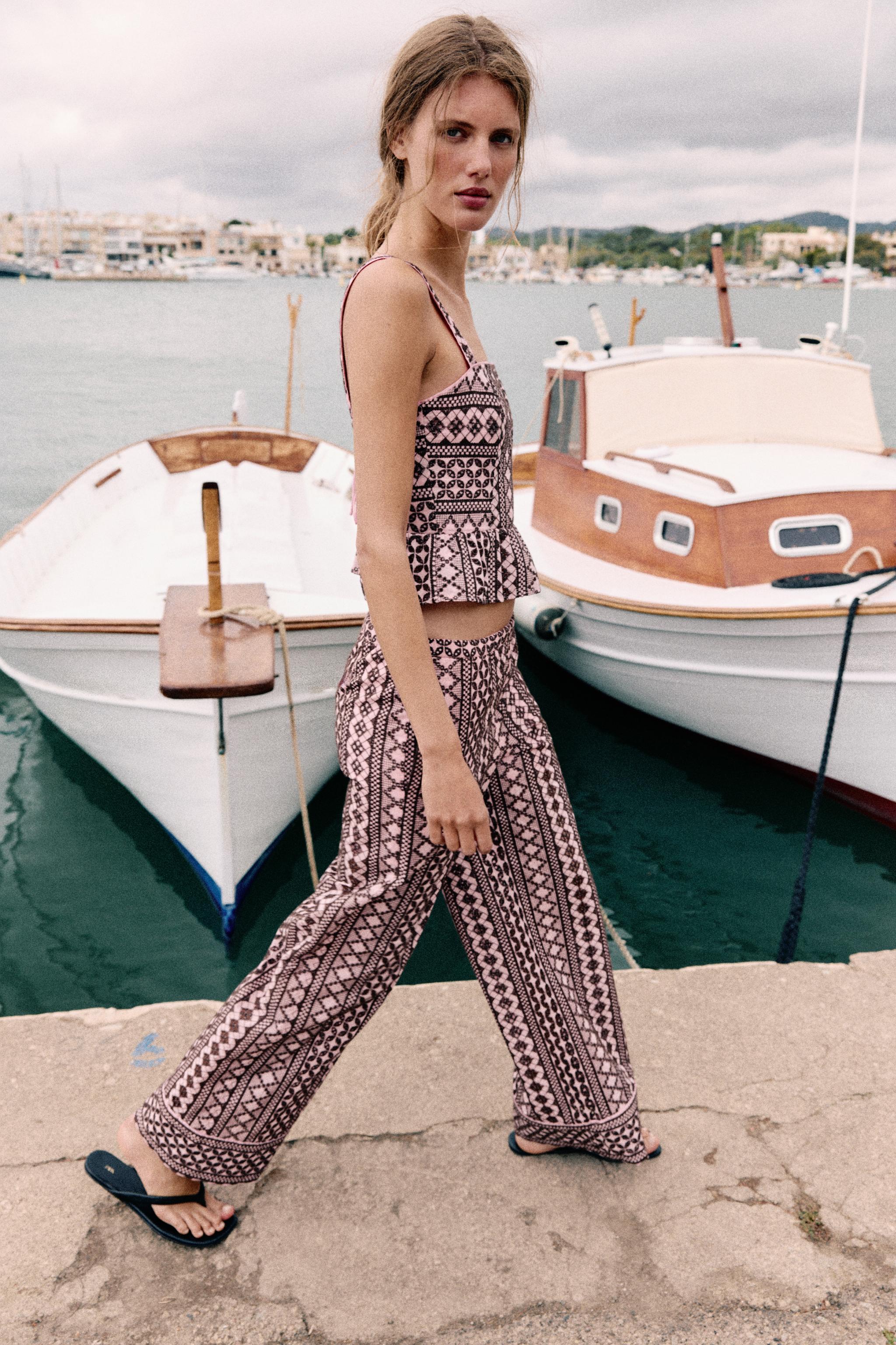 EMBROIDERED EYELET TOP